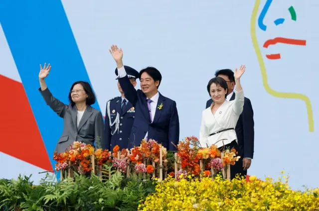 Taiwan's former President Tsai Ing-wen, new President Lai Ching-te and new Vice President Hsiao Bi-khim wave during the inauguration ceremony outside the Presidential office building in Taipei, Taiwan May 20, 2024. REUTERS/Carlos Garcia Rawlins