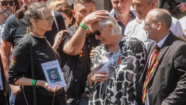 Victims pictured outside Central Hall in Westminster following the publication of the Infected Blood Inquiry report