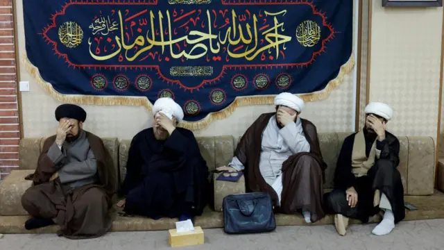 Religious clerics offer condolences over the deaths of Iran's President Ebrahim Raisi and others, at the representative office of Iran's Supreme Leader Ayatollah Ali Khamenei in Najaf, Iraq