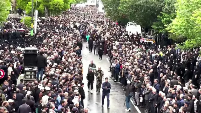 Thousands gather in the streets of Tabriz for the funeral ceremony of Iranian President Raisi