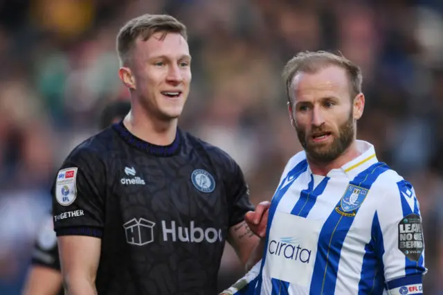 Barry Bannan of Sheffield Wednesday is pushed by Ross McCrorie of Bristol City during the Sky Bet Championship match between Sheffield Wednesday and Bristol City at Hillsborough