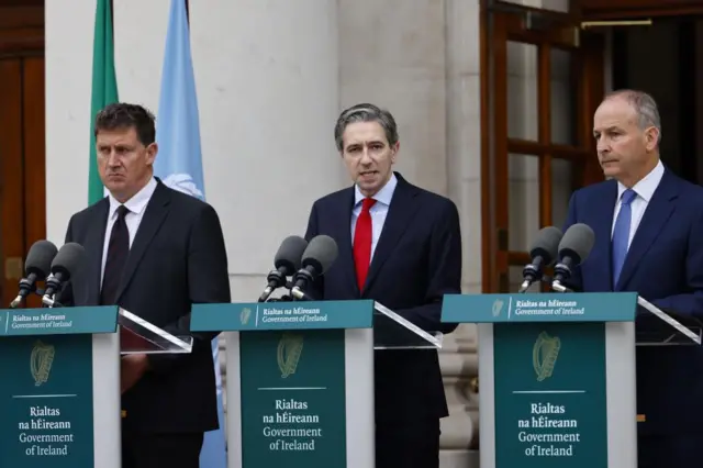 Simon Harris (centre) in Dublin