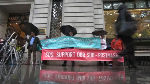 Campaigners outside Aldwych House, central London, where the Post Office Horizon IT inquiry is taking place. Picture date: Wednesday May 22, 2024.