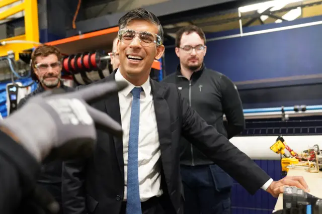 Prime Minister Rishi Sunak during his visit to a maritime technology centre at a dockyard in Northern Ireland