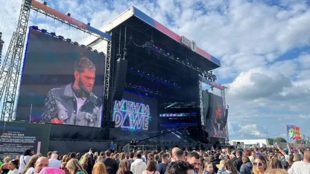 Crowds in front of the stage to watch Nathan Dawe perform