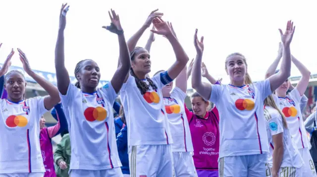 Lyon celebrate reaching the Champions League final