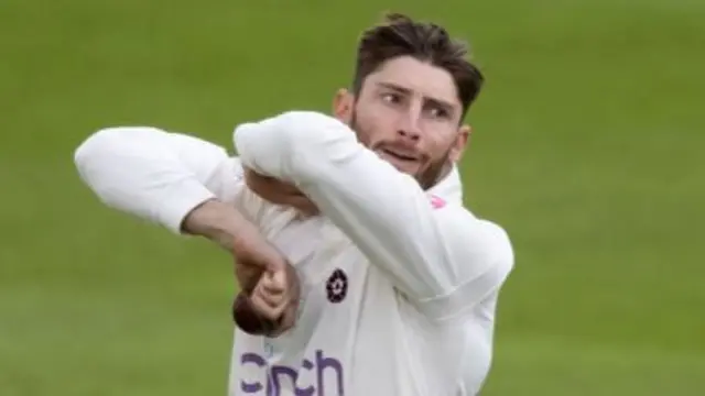 Rob Keogh bowling for Northamptonshire