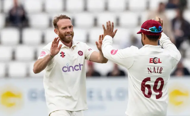 Luke Procter takes a wicket