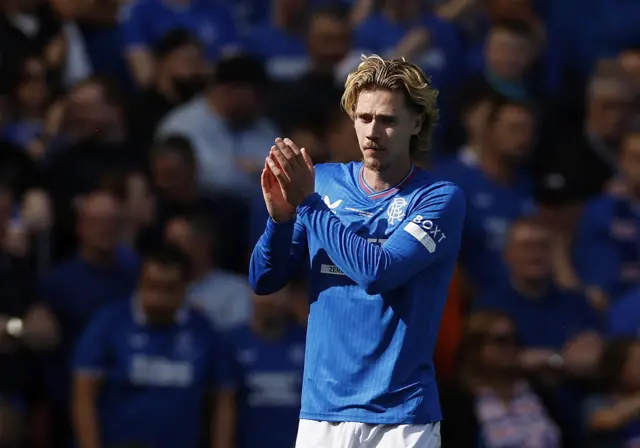 Todd Cantwell applauds the crowd after being subbed off