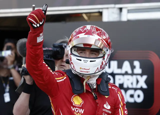 Charles Leclerc celebrates his polo in Monaco