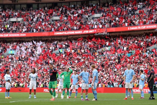 Manchester City players dejected