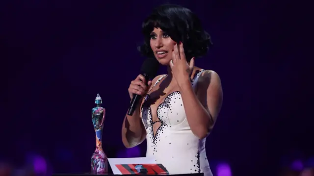 RAYE speaks after receiving an award for Artist of the Year at the Brit Awards at the O2 Arena in London, Britain, March 2, 2024