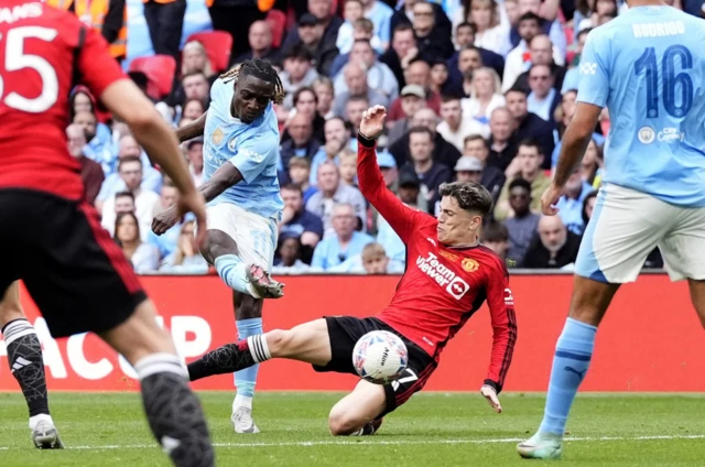 Jeremy Doku scores for Manchester City