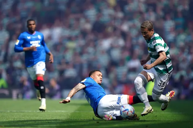 ' James Tavernier is evaded by Celtic's Daizen Maeda