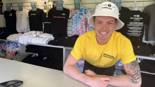 Tommy’s working one of the merch stands and kindly offered to model a  Long Boi bucket hat for Newsbeat