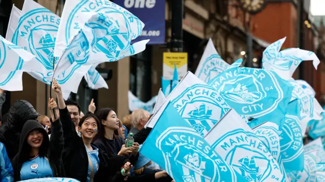 fans waving flags