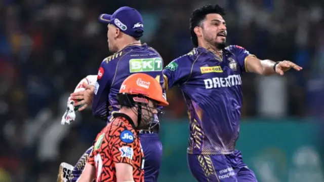 Kolkata Knight Riders' Vaibhav Arora (R) celebrates after taking the wicket of Sunrisers Hyderabad's Travis Head (L) during the Indian Premier League (IPL) Twenty20 final cricket match between Sunrisers Hyderabad and Kolkata Knight Riders at the MA Chidambaram Stadium