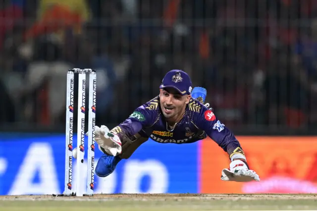 Kolkata Knight Riders' wicketkeeper Rahmanullah Gurbaz unsuccessfully dives to stump the wickets of Sunrisers Hyderabad's Abhishek Sharma during the Indian Premier League (IPL) Twenty20 final cricket match between Sunrisers Hyderabad and Kolkata Knight Riders at the MA Chidambaram Stadium in Chennai