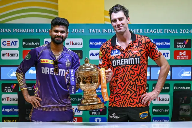 Shreyas Iyer and Pat Cummins with the IPL trophy