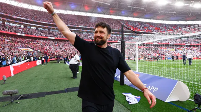 Russell Martin celebrates in front of the Southampton fans