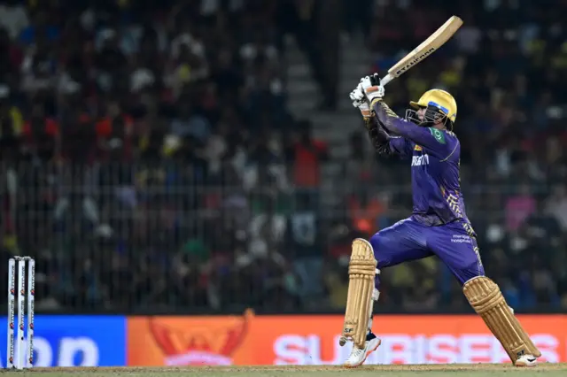 Kolkata Knight Riders' Venkatesh Iyer watches the ball after playing a shot during the Indian Premier League (IPL) Twenty20 final cricket match between Sunrisers Hyderabad and Kolkata Knight Riders at the MA Chidambaram Stadium in Chennai