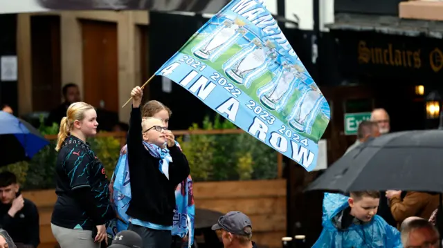 Fan with a flag