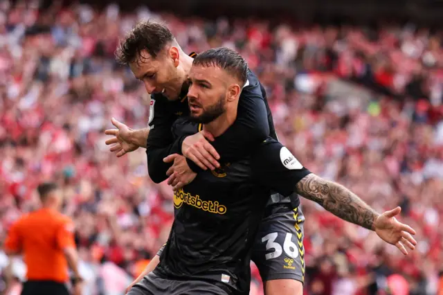 Adam Armstrong celebrates scoring the only goal of the game