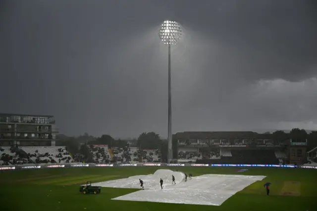 The County Ground at Taunton with heavy rain and dark clouds