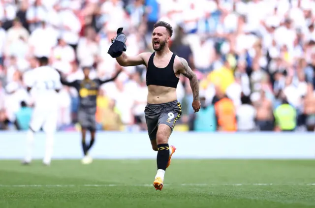 Adam Armstrong celebrates