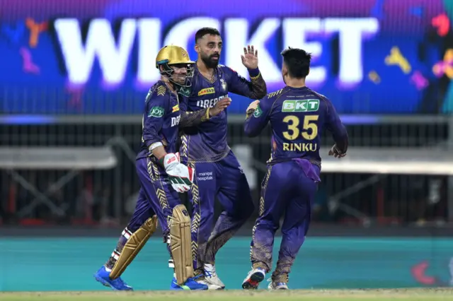 Varun Chakravarthy celebrates the wicket of Shahbaz Ahmed