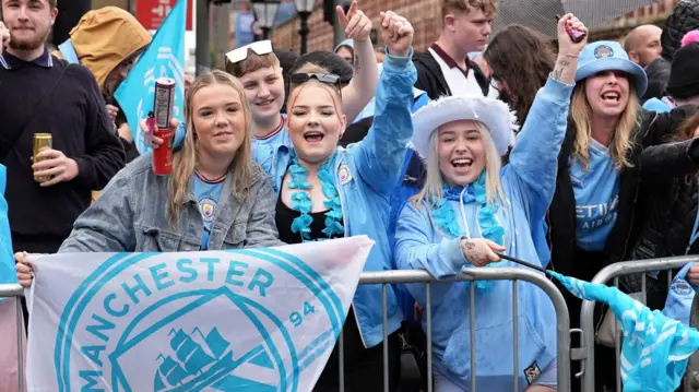 Manchester City fans celebrating