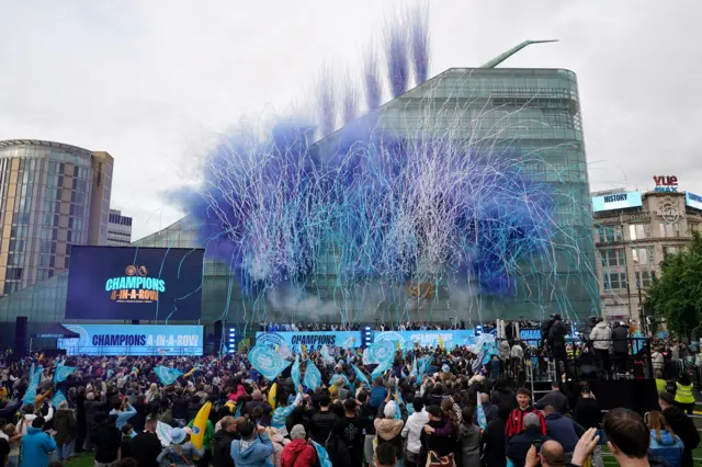 blue confetti outside Museum