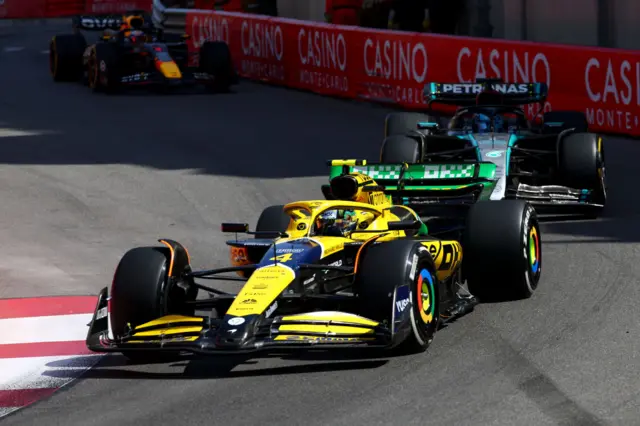lando norris leading george russell