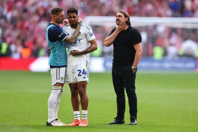 Daniel Farke and Leeds players look sad