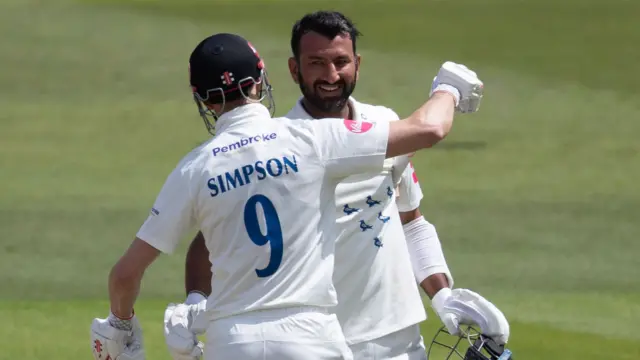 John Simpson congratulates Cheteshwar Pujara