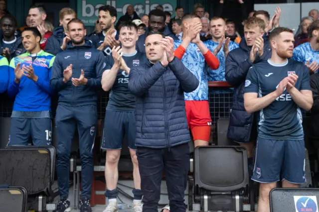 Don Cowie and his players applaud the happy fans in Dingwall