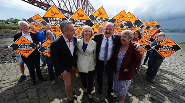 Liberal Democrat leader Sir Ed Davey stands with Alex Cole-Hamilton (left), and parliamentary candidates Susan Murray (centre) for East Dunbartonshire and Christine Jardine for Edinburgh West (right), during their party's Scottish launch at North Queensferry, while on the General Election campaign trail