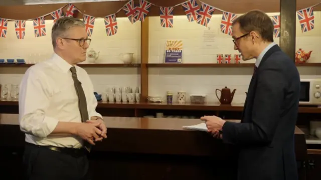 Mason and Starmer in front of union flags