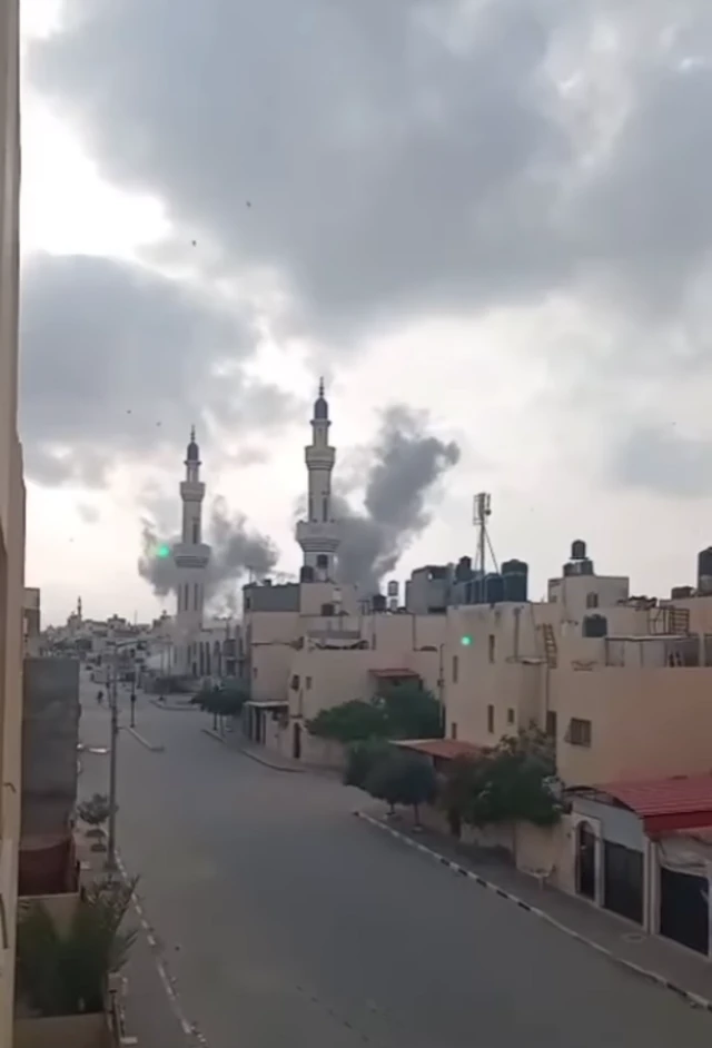 Smoke rising over the Taiba mosque, Tal as Sultan, Rafah, morning of 28 May