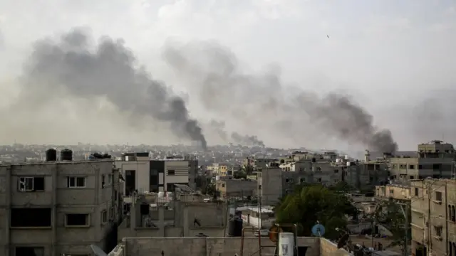 Smoke rises following Israeli strikes during an Israeli military operation, in Rafah