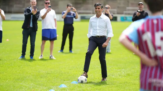 Prime Minister Rishi Sunak during his visit to Chesham United Football Club, while on the General Election campaign trail. Picture date: Monday May 27, 2024. PA Photo. See PA story POLITICS Election.