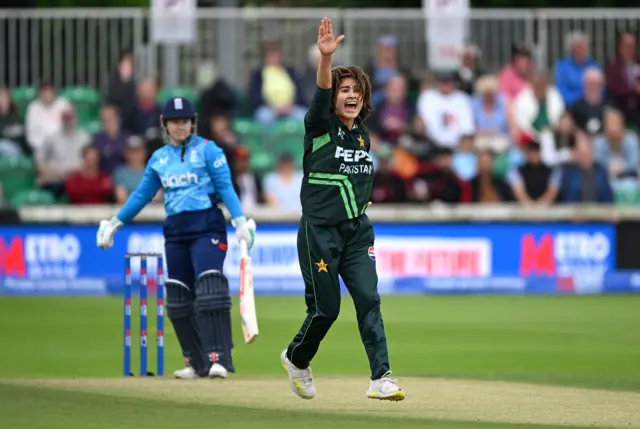 Dian Baig appeal for the wicket of Tammy Beaumont