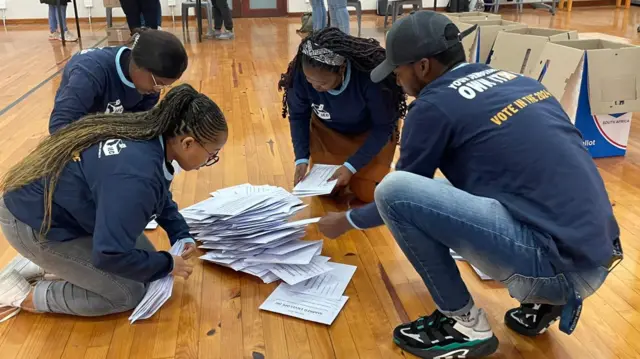 Poll officials and party observers