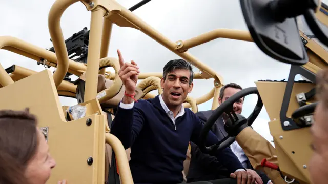 Rishi Sunak examines Jackal armoured vehicles