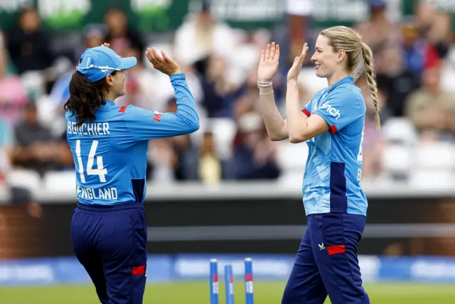 Lauren Bell celebrates the wicket of Sidra Ameen