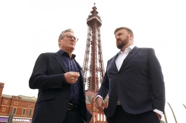 Labour leader Sir Keir Starmer, with Chris Webb, Labour's candidate for the Blackpool South parliamentary by-election, during his visit to Blackpool seafront in Lancashire