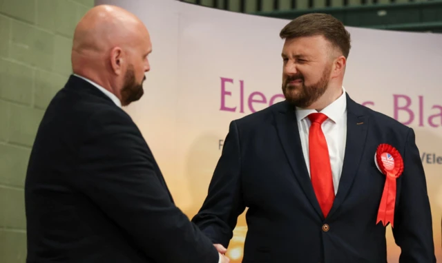 Labour Parliamentary Candidate for Blackpool South Chris Webb reacts after Labour won a Parliamentary by-election in Blackpool