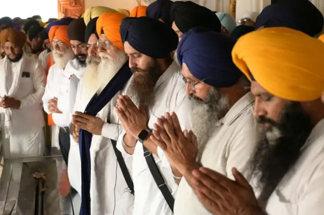 Activists of the Dal Khalsa Sikh organisation, a pro-Khalistan group, offer prayers for Sikh separatist Hardeep Singh Nijjar, who was killed in June 2023 near Vancouver, at the Golden Temple in Amritsar on September 29, 2023.