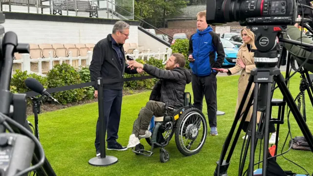 Keir Starmer speaking to Ellis Palmer