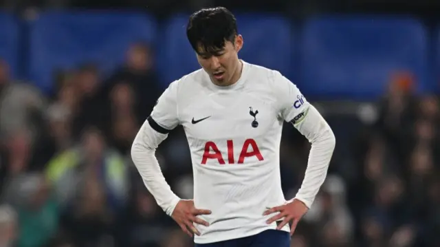 Son Heung-min hangs his head after Chelsea defeat